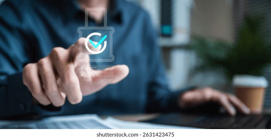 Cyber security system technology. Secure information privacy. Crime network technology. A man is pointing at a check mark on a computer screen. Concept of approval or success. The man's hand gesture.