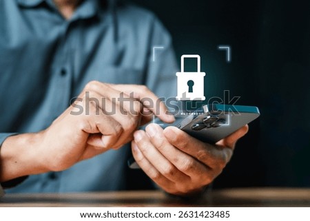 Cyber security system technology. Secure information privacy. Crime network technology. A man is using a cell phone with a lock icon on the screen. Concept of security and protection.
