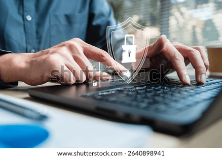 Cyber security system technology. Secure information privacy. Crime network technology. A person is using a laptop with a security lock icon on the screen.