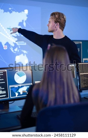 Cyber security team working in a Cyber Security Operations Center SOC to protect datacenter from security breach