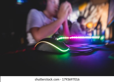 Cyber sport e-sports tournament, team of professional gamers, close-up on gamer's hands on a keyboard, pushing button, gamers playing in competitive moba/strategy fps game on a cyber games arena club - Shutterstock ID 1793697016