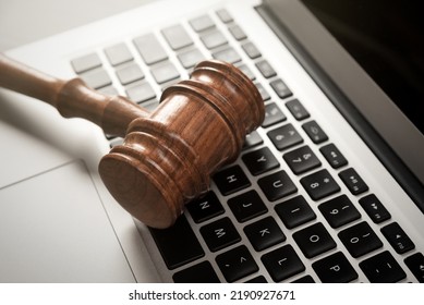 Cybercrime Concept With Gavel On Laptop. Law And Justice.