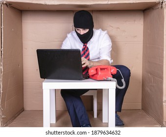 Cybercrime Fighter, Focused And Hard At Work On A Laptop