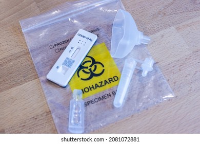 Cyberjaya, Malaysia - November 21, 2021: The Latest Covid 19 Spit Test Or Quick Test. Public Places Are Only Allowed If The Visitor Do A Corona Self Test. After Use The Bag Is Classified  Biohazard