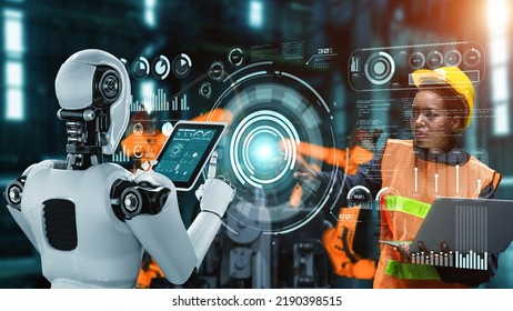 Cybernated industry robot and human worker working together in future factory . Concept of artificial intelligence for industrial revolution and automation manufacturing process . - Shutterstock ID 2190398515