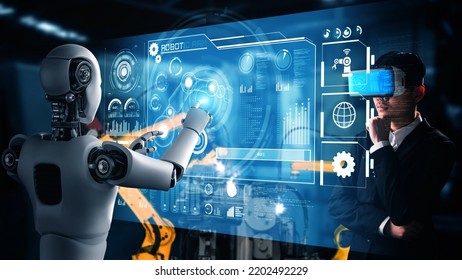 Cybernated industry robot and human worker working together in future factory . Concept of artificial intelligence for industrial revolution and automation manufacturing process . - Shutterstock ID 2202492229