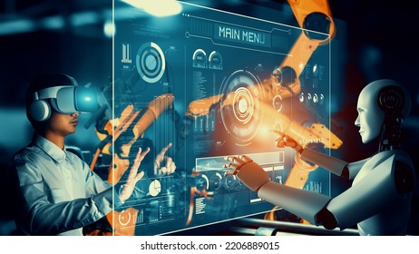 Cybernated industry robot and human worker working together in future factory . Concept of artificial intelligence for industrial revolution and automation manufacturing process . - Shutterstock ID 2206889015