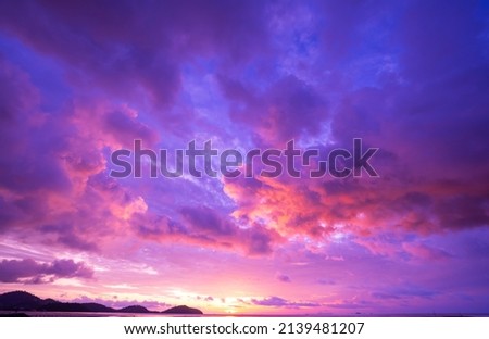 Cyberpunk color trend popular background. Nature beautiful Light Sunset or sunrise colorful Dramatic majestic scenery Sky with Amazing clouds in sunset sky purple light cloud background