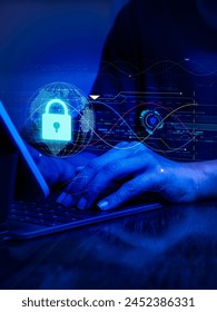 Cybersecure, worldwide internet network security technology, privacy digital data protection concepts. Safety shield lock icon hologram appears while business person work with digital tablet computer.
