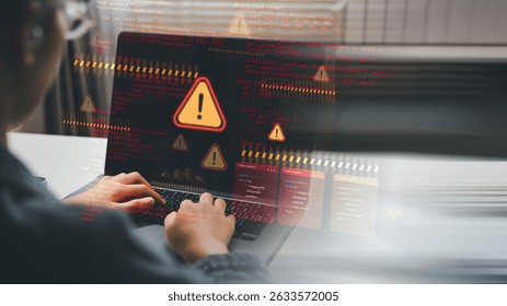 Cybersecurity alert concept showing hacker threat or malware warning with red exclamation icons and programming code overlay on laptop screen. Digital data breach scene.