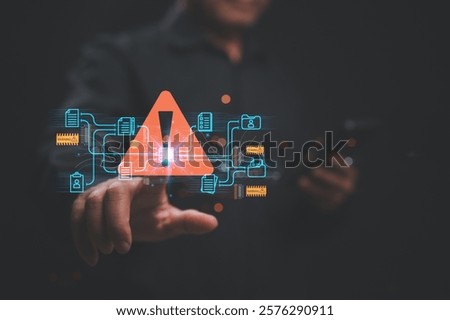 Cybersecurity Alert Data Breach Notification, Warning symbol emerges as user interacts with data-driven technology, emphasizing importance of cybersecurity awareness