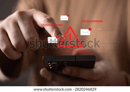 Cybersecurity alert and system warning concept with a user receiving suspicious email notifications on a smartphone. Phishing attack, data breach, online security, cyber threat and risk management.