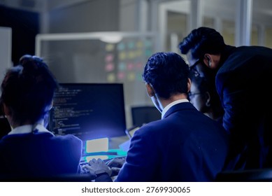 Cybersecurity analysts executing threat mitigation protocols in security operations center. IT specialists monitoring network firewall intrusion detection.