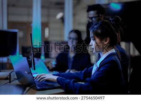 Cybersecurity analysts executing threat mitigation protocols in security operations center. IT specialists monitoring network firewall intrusion detection.