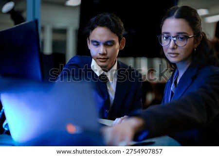 Cybersecurity analysts mitigating network intrusion threats in blue team SOC. Digital forensic experts executing firewall vulnerability protocols at night.