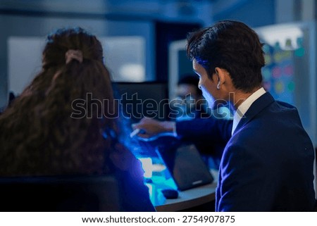 Cybersecurity analysts mitigating network intrusion threats in blue team SOC. Digital forensic experts executing firewall vulnerability protocols at night.