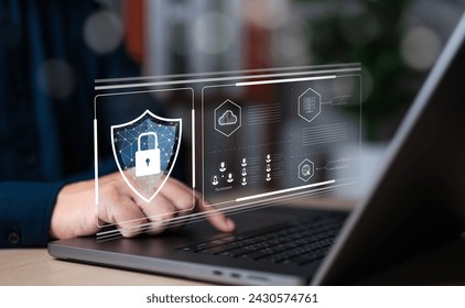 Cybersecurity awareness and data protection. Engineer or IT staff use computer to set firewall networks for safe information clouding. Protection from hackers, identification, and authentication.