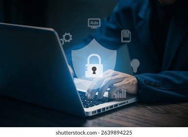 Cybersecurity concept with businessman typing on laptop, protected by digital lock icon. Data protection, privacy, and secure internet communication technology.