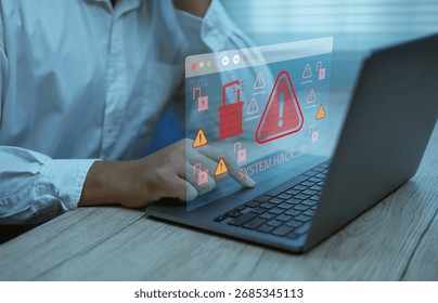 Cybersecurity concept with hacker attack warning, system hack alert on laptop screen, data breach protection, and online security access risk awareness for digital safety and IT security solutions