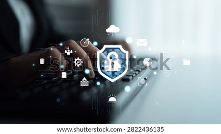 Cybersecurity Concept with Hand Typing on Keyboard and Digital Lock Symbol Overlayed on Technology Background for Modern Data Protection and Privacy Quark.