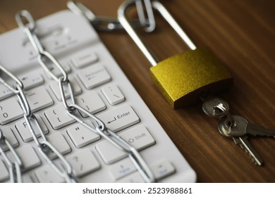 Cybersecurity Concept: Locked Keyboard with Chains and Padlock Symbolizing Data Protection - Powered by Shutterstock