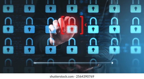 Cybersecurity concept showing a person interacting with a red highlighted padlock among blue ones on a digital interface, symbolizing protection - Powered by Shutterstock - Get 15% off with code: PIKWIZARD15