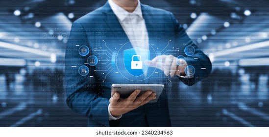Cybersecurity and data protection, businessman use secure tablet encryption technology, protect business and financial transaction data from cyber attacks, intelligent protection digital attacks.