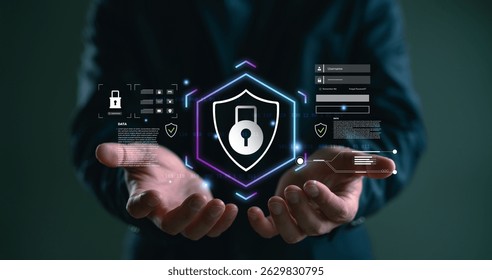 Cybersecurity and data protection concept. A businessman holds a digital shield with lock icon, login form, and binary code, representing online privacy, secure access, and information safety.