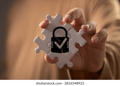 Cybersecurity and data protection concept featuring a secure lock within connected puzzle pieces, symbolizing privacy, compliance, risk management, information security, trust, and system integrity.