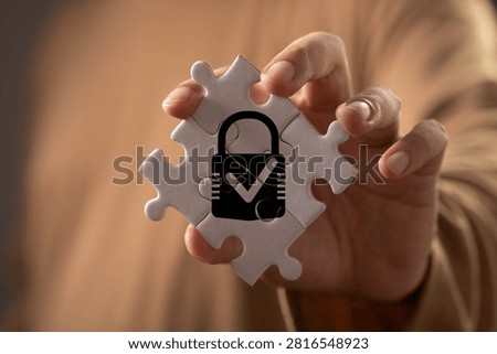 Cybersecurity and data protection concept featuring a secure lock within connected puzzle pieces, symbolizing privacy, compliance, risk management, information security, trust, and system integrity.