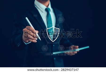 Cybersecurity and data protection concept featuring a business professional managing digital security, encryption, privacy protection, secure access, risk management, and cyber defense technology.