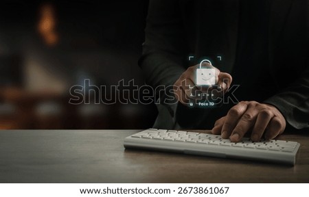 Cybersecurity and face ID authentication concept, businessman using biometric verification with digital lock icon while working on computer in modern office environment.