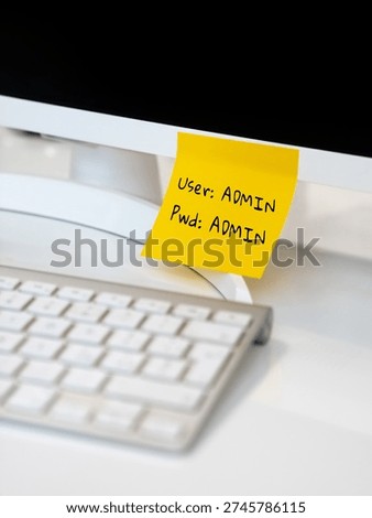 Cybersecurity failure. Simple admin login User and password written on a sticky note next the computer