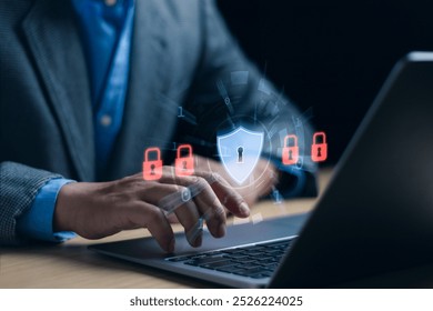 Cybersecurity and Global network security technology concept,Businessman protecting personal data on computer with virtual interface, internet secure technology ,firewall ,cyber security.