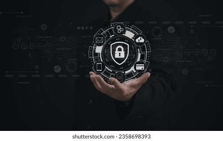 cybersecurity or internet access security concept : Business man holding  the virtual screen to lock or unlock important data on laptop using computer security system.