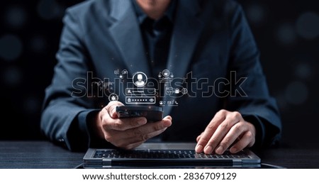 Cybersecurity login authentication and personal data privacy concept. Businessman holding smartphone with virtual username password form, VPN and malware protection icons.