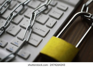 Cybersecurity Measures and Data Protection with Locked Keyboard and Chain