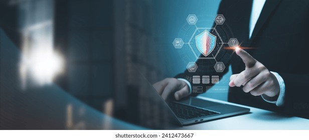 Cybersecurity and network data protection concept, businessman using laptop connecting to internet network security, encryption security of personal data and online transactions and communication.