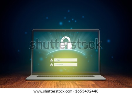 Cybersecurity and notebook computer security app concept. Login screen and padlock symbolizing security on computer.