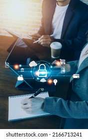 Cybersecurity and privacy concepts to protect data. Lock icon and internet network security technology. Businessman protecting personal data on smart phone with virtual screen interfaces. - Shutterstock ID 2166713241