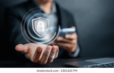 Cybersecurity and privacy concepts to protect data. businessman with internet network security technology. Businessman locking personal data on smartphone. cyber security concept.