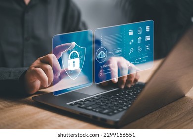 Cybersecurity privacy of data protection, Businessman using laptop protection and Secure encryption technology firewall security in online network, secured access to user personal data concept - Shutterstock ID 2299156551