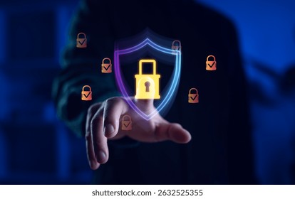 Cybersecurity protection concept with a hand touching a glowing padlock and shield icon, representing data security, encryption, and secure digital access in a high-tech environment.