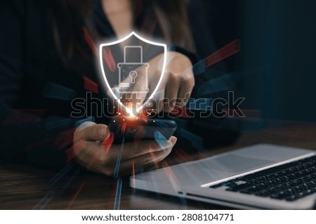 Cybersecurity protection concept with secure shield and lock icon above smartphone, illustrating data privacy, network defense, cyber protection, encryption, and digital security solutions.