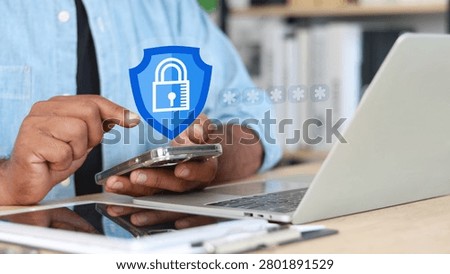 Cybersecurity protection concept with user accessing smartphone and laptop secured by digital shield and padlock icon. Mobile security, password authentication, data privacy, cyber defense and online protection.