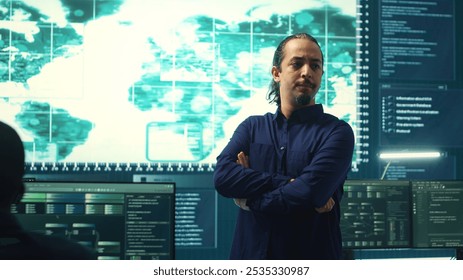 Cybersecurity team investigating cybercrime and malware attacks. IT security experts analyzing threats and protecting national security, working on data protection and privacy. Cyberwarfare. Camera A. - Powered by Shutterstock