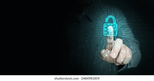 Cybersecurity technology. A man using virtual digital padlock to protect and grant access to his personal data or cyber security. Safe and secure internet network