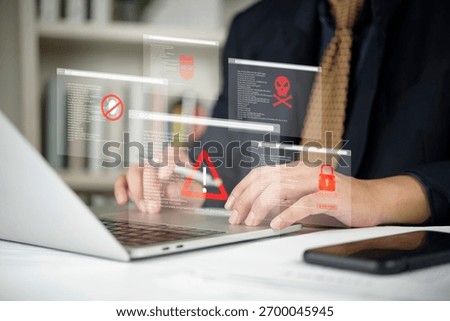 Cybersecurity threat, hacker attack concept. Businessman using laptop, system alert, data breach warning. Virtual interface show malware, virus, password risk. Internet security failure.