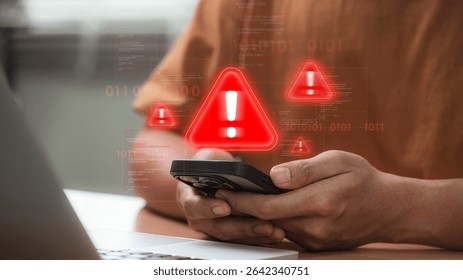 Cybersecurity threat warning on smartphone with red alert icon signaling hacking attempt, virus infiltration, and data breach while user checks phone at home, showing mobile cyberattack risk