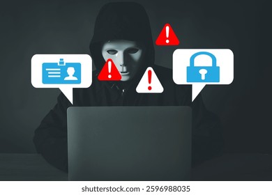 Cybersecurity threat,Online security concept.,Hacker in a dark room with a laptop, symbolizing cybercrime, data breaches, and online fraud.